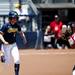 Michigan senior Amy Knapp runs to first in the game against Louisiana-Lafayette on Saturday, May 25. Daniel Brenner I AnnArbor.com